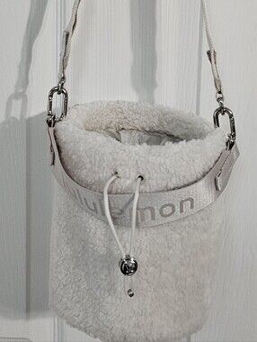 Lululemon Off White Shearling Crossbody Bucket Bag with Branded Strap